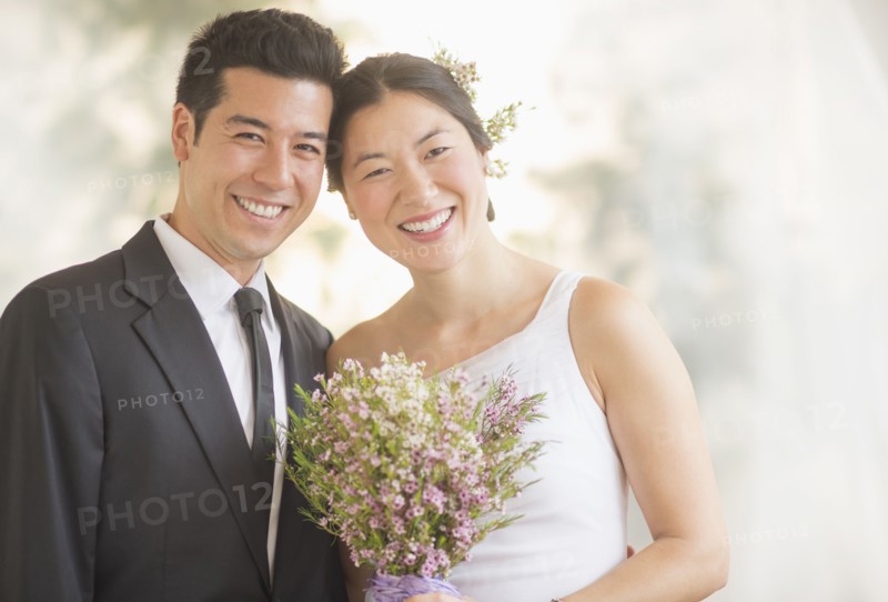 Newlywed couple smiling