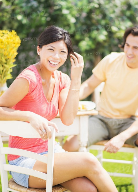 Couple relaxing together outdoors