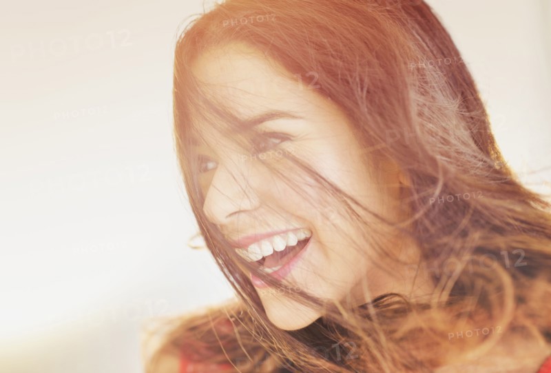 Close up of smiling Hispanic woman