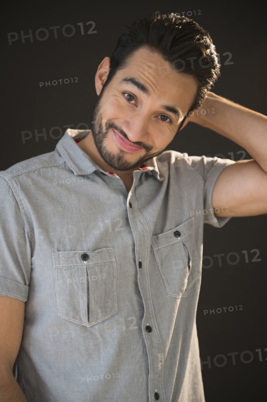 Mixed race man smiling