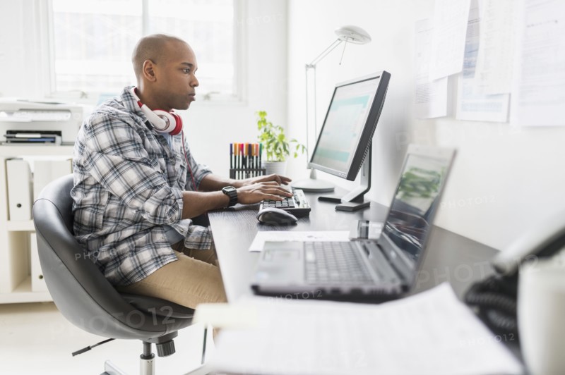 Black businessman working in office