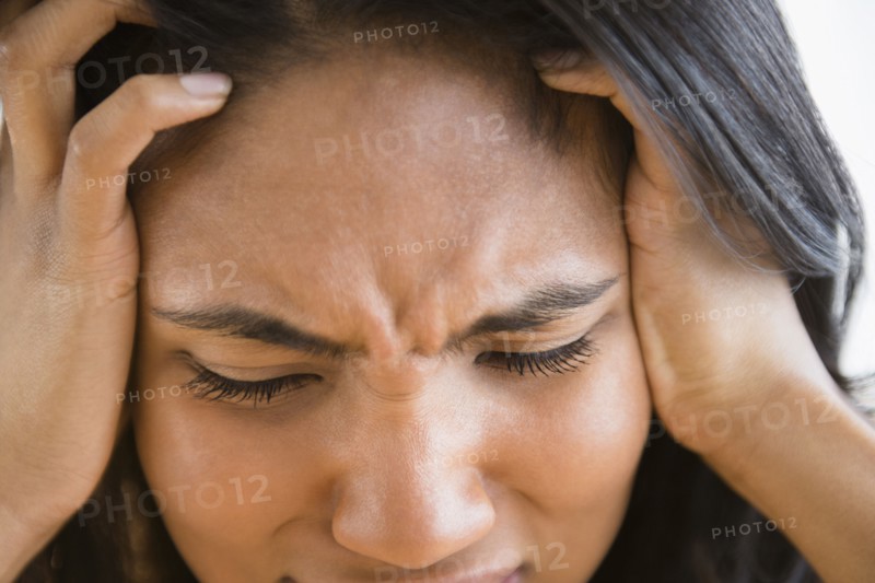 Mixed race woman thinking