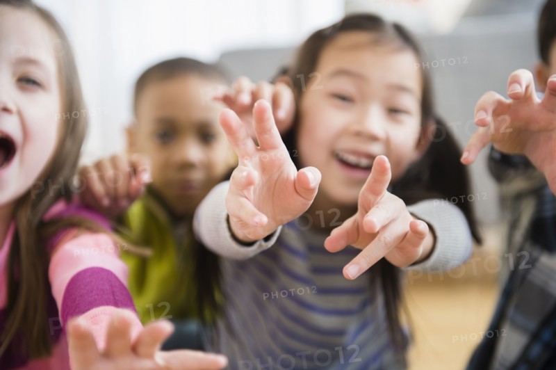 Children playing in living room