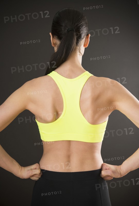 Caucasian woman with hands on hips