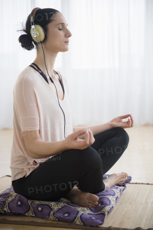 Caucasian woman meditating