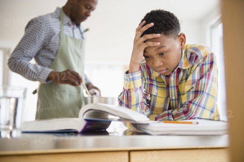 Frustrated boy doing homework