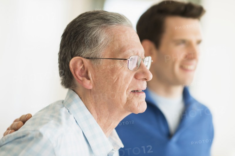 Caucasian father and son smiling