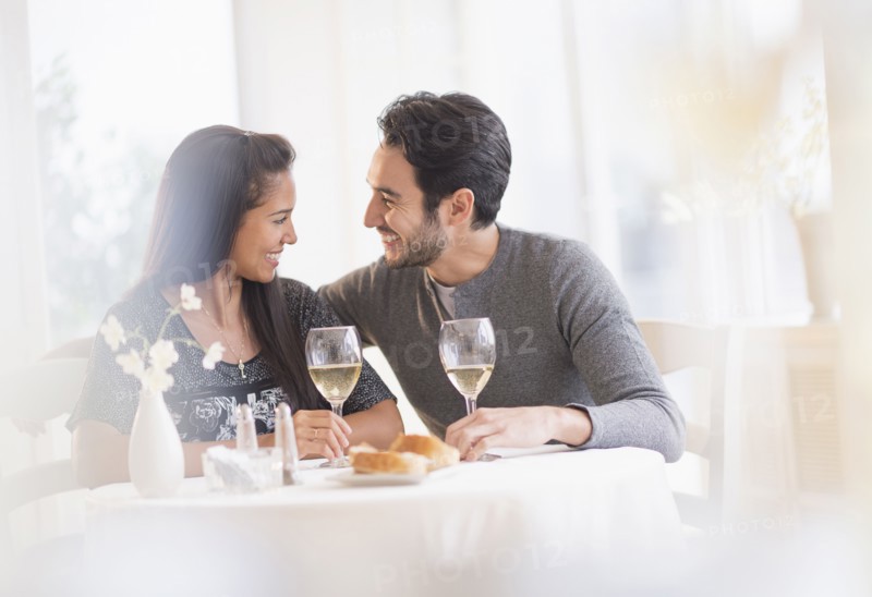 Couple having dinner together in restaurant