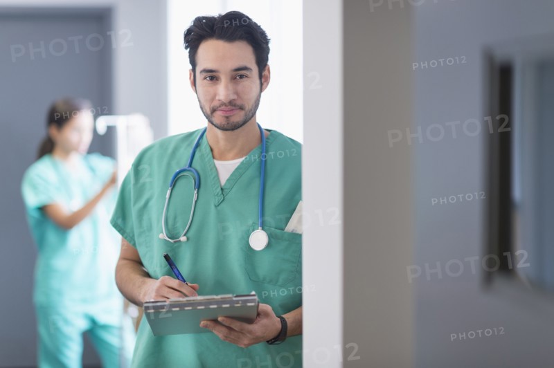 Mixed race nurse working in hospital
