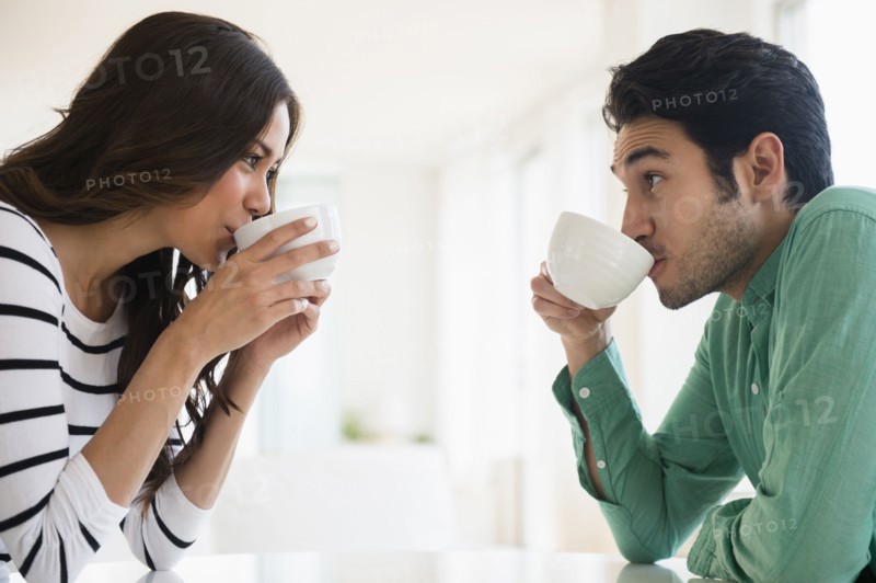 Couple drinking coffee together