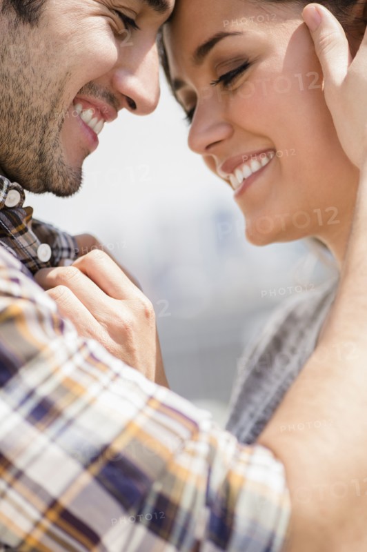Smiling couple hugging