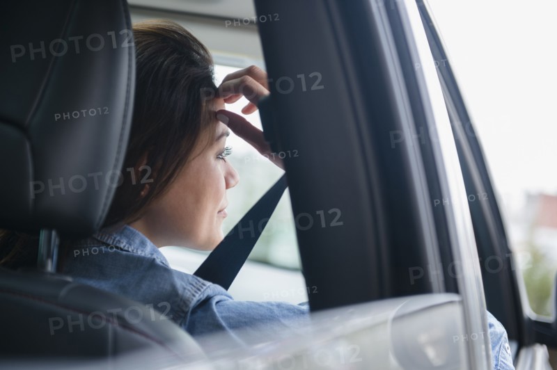 Woman smiling in car