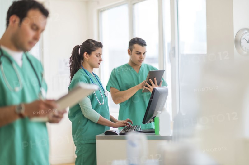 Hispanic nurses working in hospital