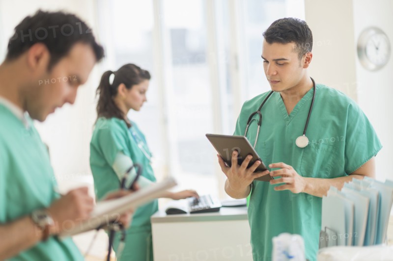 Hispanic nurses working in hospital