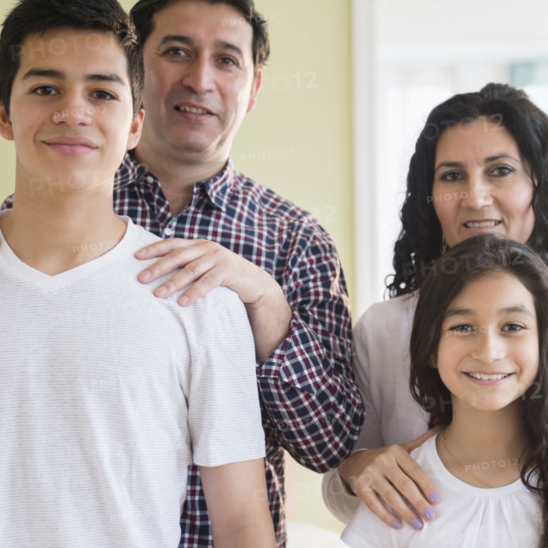 Hispanic family smiling