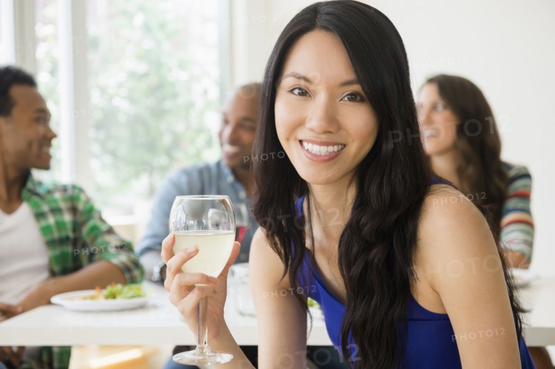 Woman smiling at restaurant