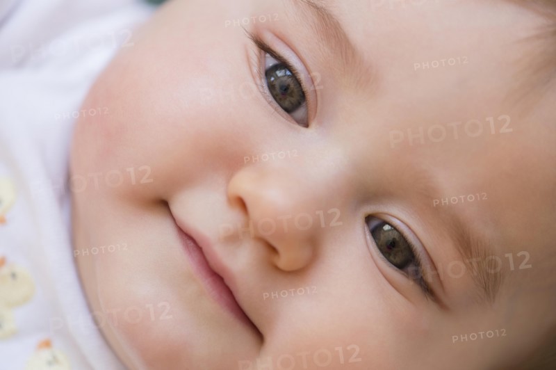 Close up of smiling mixed race baby