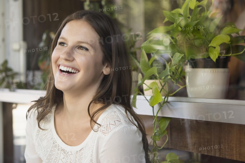 Caucasian woman laughing outdoors