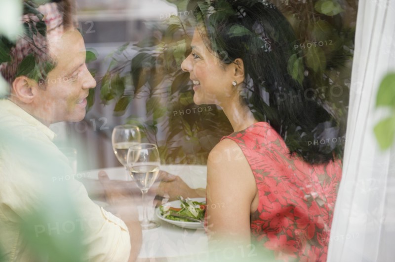 Couple talking in restaurant