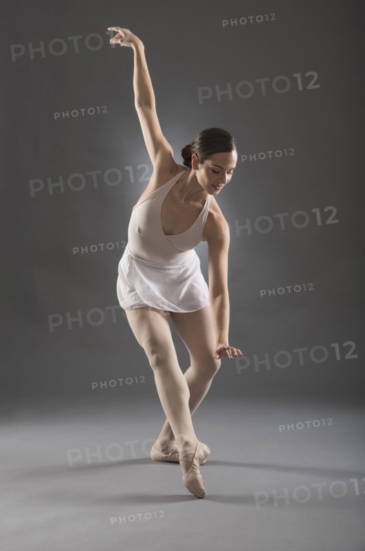 Hispanic ballet dancer posing
