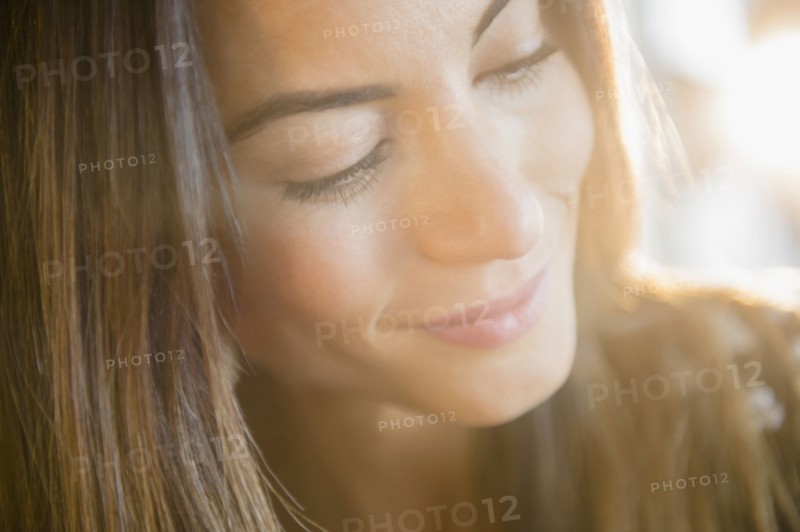 Close up of face of smiling Caucasian woman