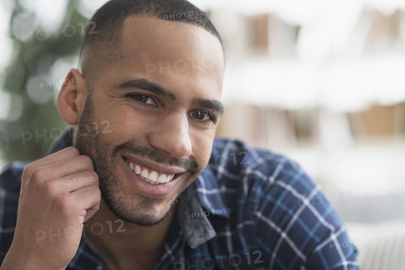 Close up of Hispanic man smiling