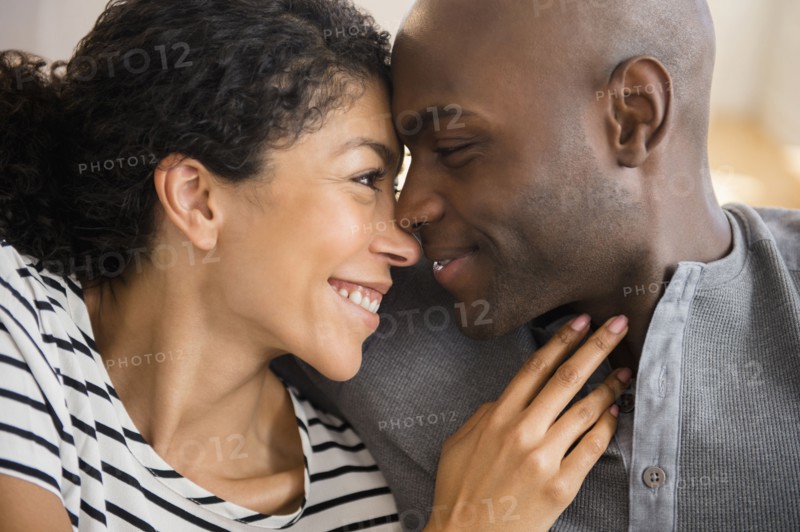 Close up of smiling couple rubbing noses