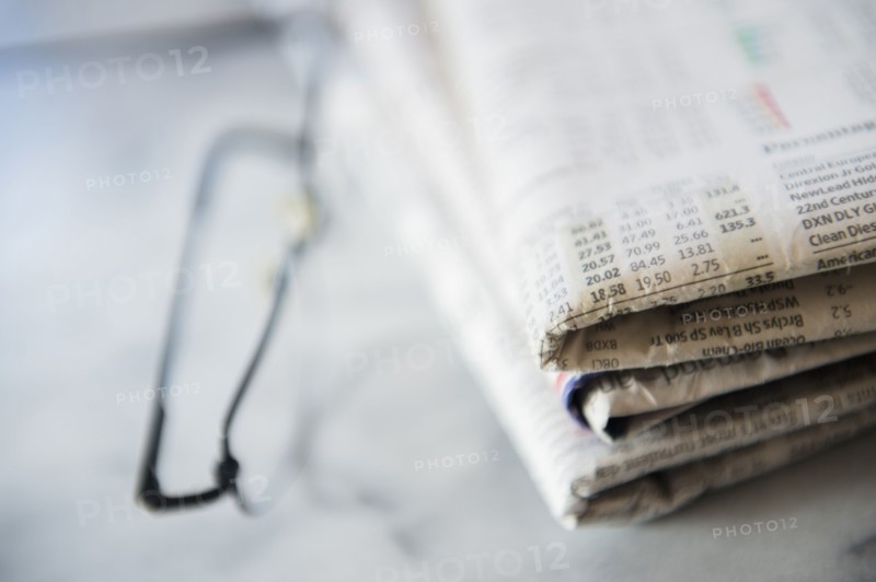 Close up of business newspaper with stocks