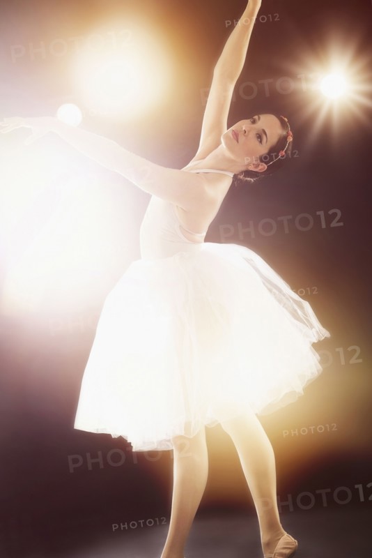 Hispanic ballet dancer performing on stage