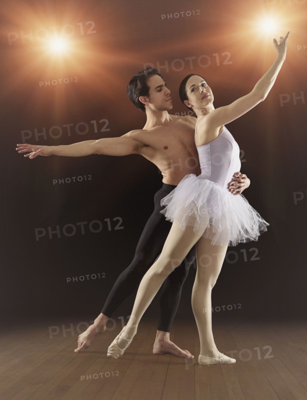 Hispanic ballet dancers performing on stage
