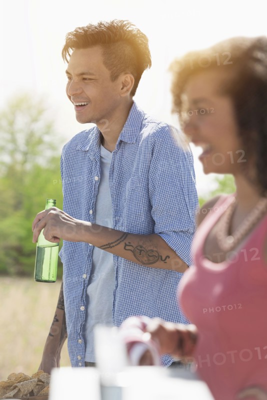 Man drinking beer outdoors