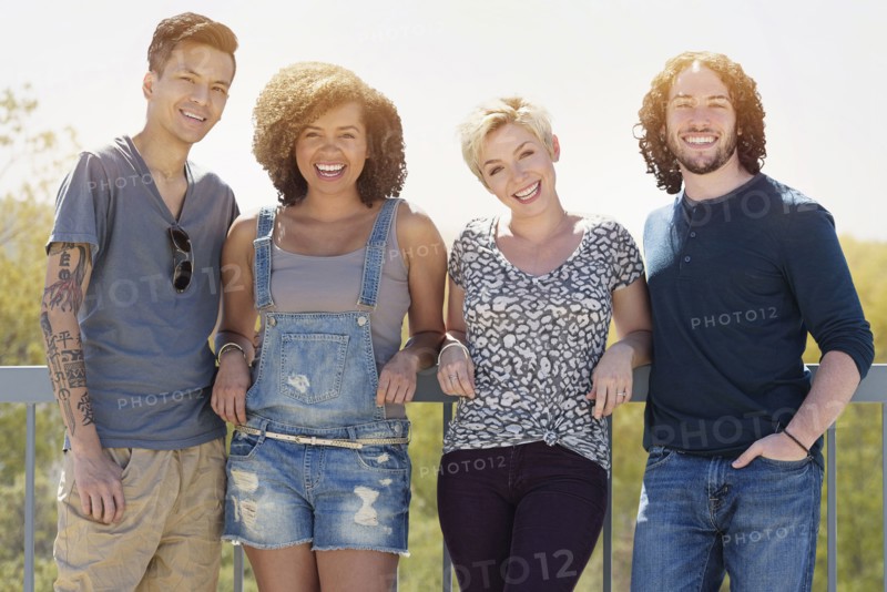 Friends smiling outdoors