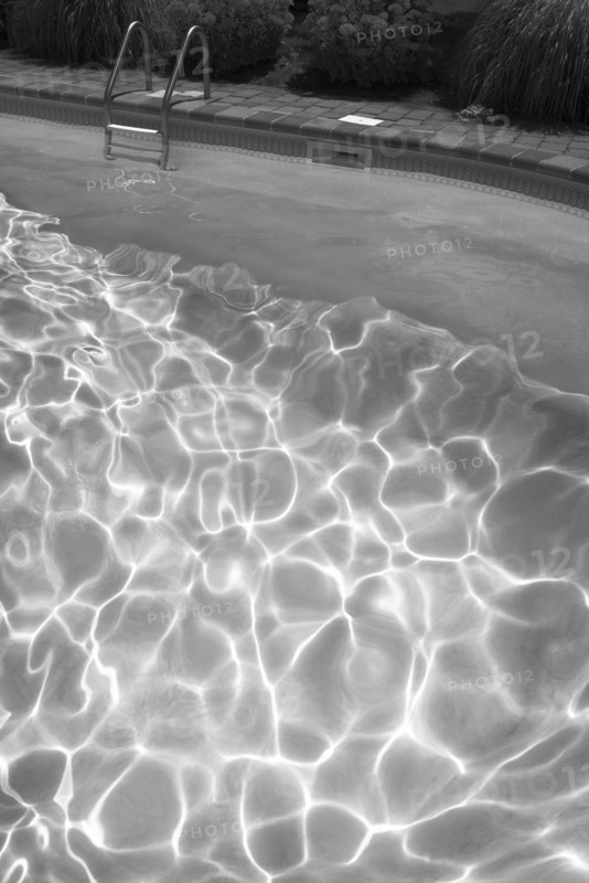 High angle view of sunbeams in swimming pool