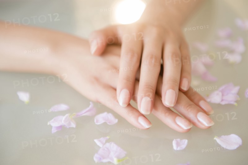 Close up of hands of Hispanic woman