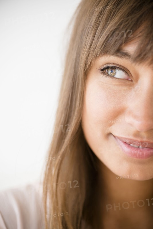 Mixed race woman looking away