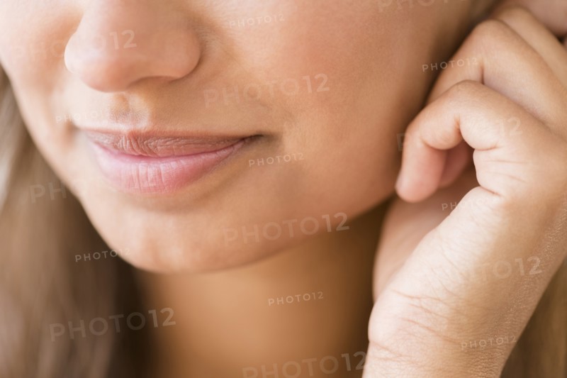 Close up of lips of mixed race woman