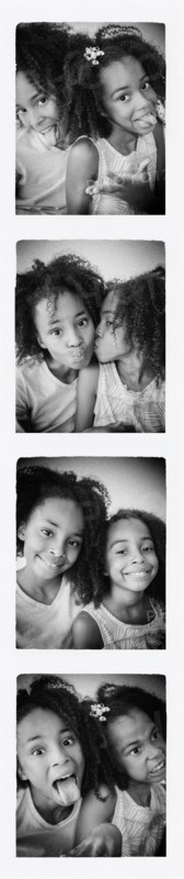 Photo strip of mixed race sisters