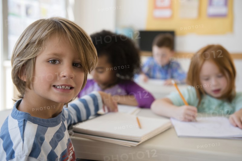 Student smiling in classroom