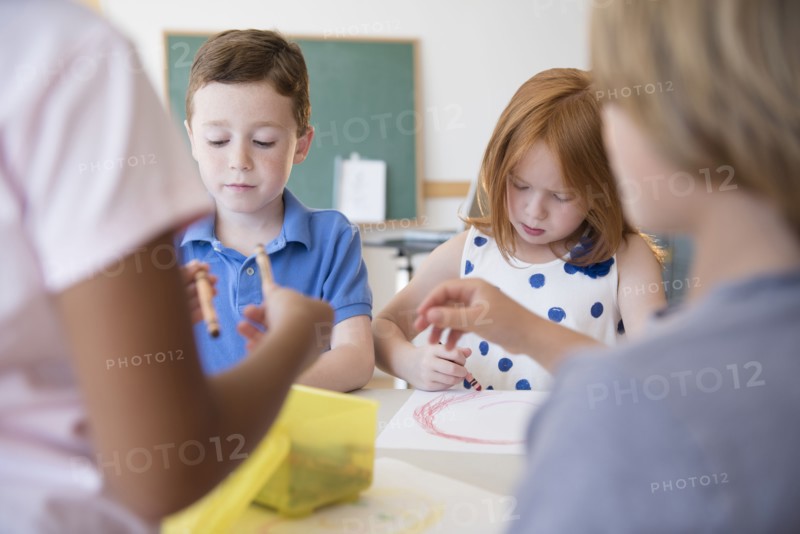 Students drawing in classroom