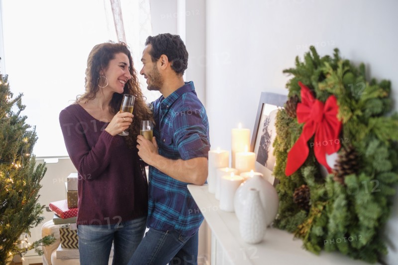 Couple drinking champagne at Christmas