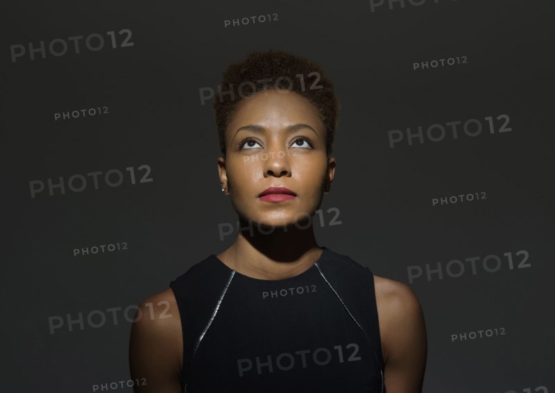 Mixed race woman looking up