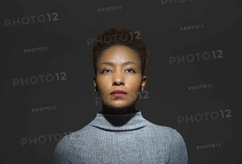 Mixed race woman looking up
