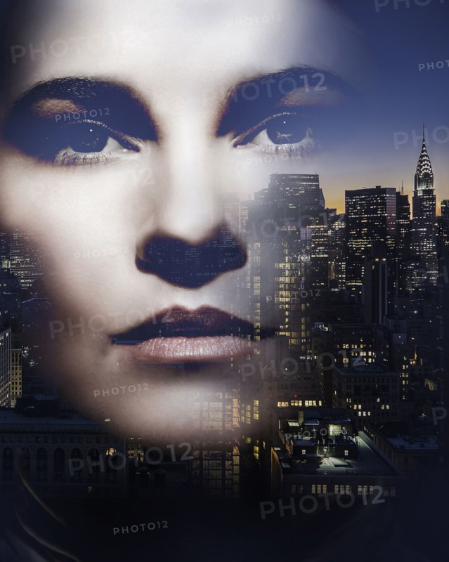 Face of Caucasian woman and New York cityscape