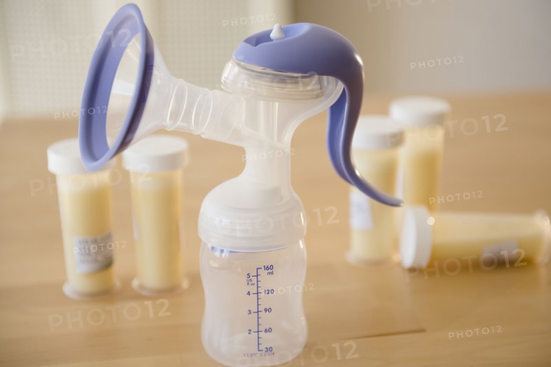 Breast pump and vials of breast milk