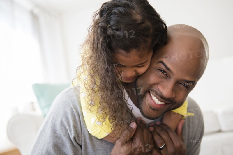 Daughter hugging father