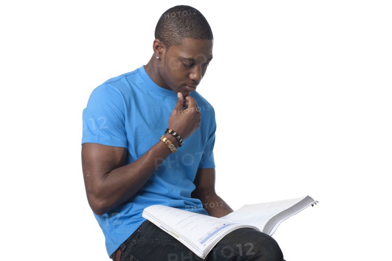Black man reading book