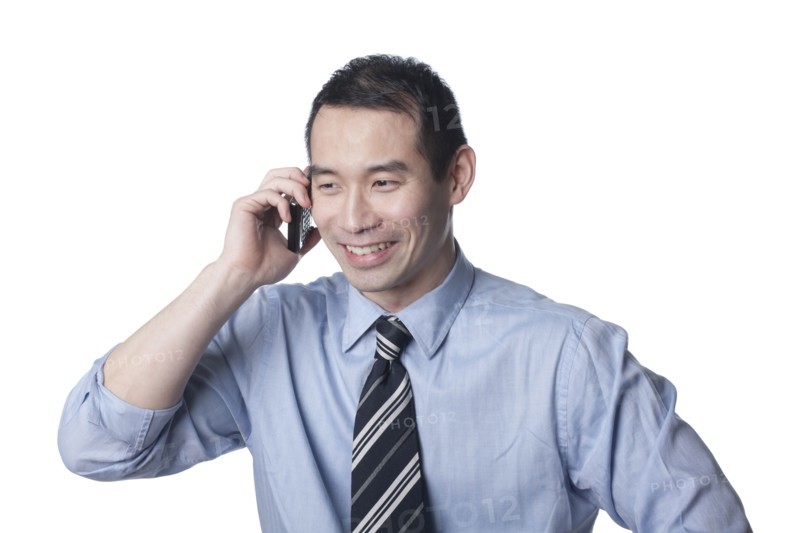 Chinese businessman talking on cell phone