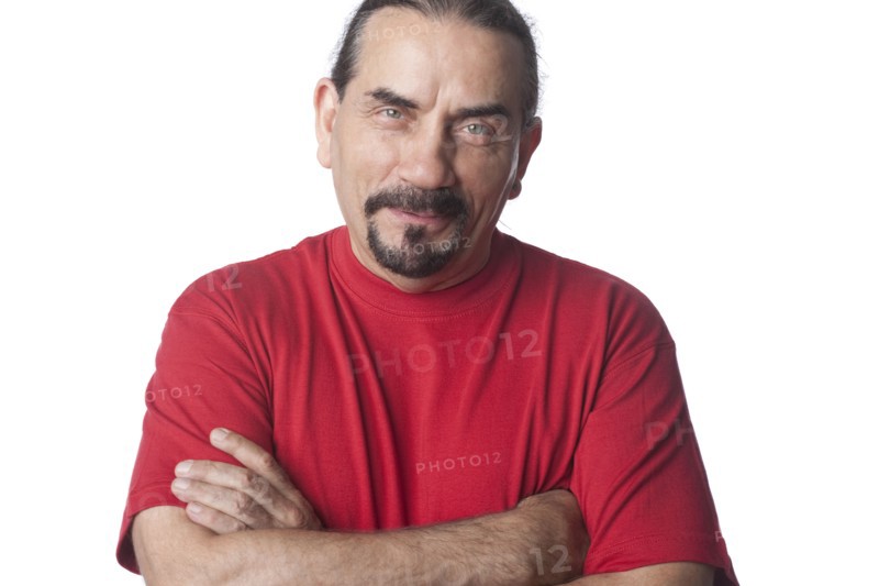 Mixed race man with arms crossed
