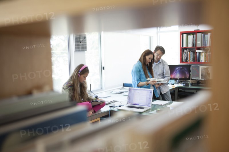 Family working in home office