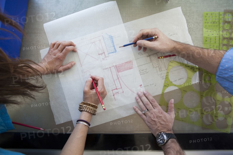 Architects working on schematics